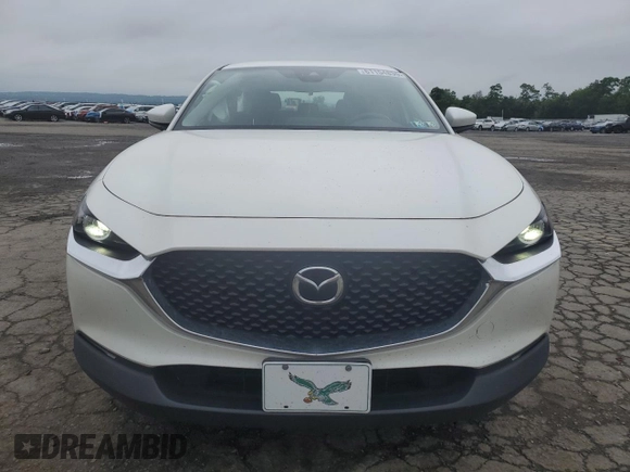 2023 Mazda CX-30 S with VIN 3MVDMBAM8PM557537, listed as a Copart auction lot 61154835 with 23,450 mi miles and Salvage title. Bid and sale history available at DreamBid. Image 5.