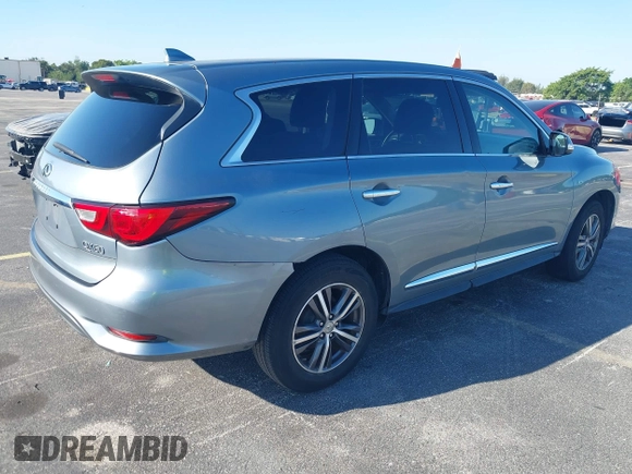 2016 Infiniti QX60 with VIN 5N1AL0MN8GC501966, listed as a IAAI auction lot 41789987 with 147,358 mi miles and . Bid and sale history available at DreamBid. Image 4.