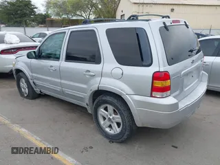 2005 Ford Escape Hybrid with VIN 1FMCU95H05KC95225, listed as a IAAI auction lot 41798610 with 216,659 mi miles and . Bid and sale history available at DreamBid. Image 3.
