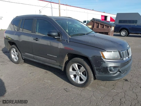 2014 Jeep Compass Sport with VIN 1C4NJCBB5ED730151, listed as a IAAI auction lot 41389291 with 176,659 mi miles. Bid and sale history available at carsss.com. Image 1.