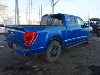 2021 Ford F-150 XL with VIN 1FTFW1CD0MFC50953, listed as a IAAI auction lot 41466036 with 33,983 mi miles and . Bid and sale history available at DreamBid. Image 4.