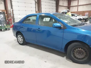 2009 Toyota Corolla with VIN JTDBL40E699037792, listed as a IAAI auction lot 41838231 with 199,690 mi miles. Bid and sale history available at carsss.com. Image 6.