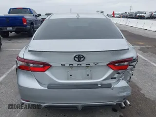 2023 Toyota Camry SE with VIN 4T1G11AKXPU809876, listed as a IAAI auction lot 42100546 with 35,055 mi miles and . Bid and sale history available at DreamBid. Image 16.