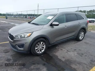 2016 Kia Sorento LX with VIN 5XYPGDA51GG012335, listed as a IAAI auction lot 42224249 with 166,752 mi miles and . Bid and sale history available at DreamBid. Image 2.