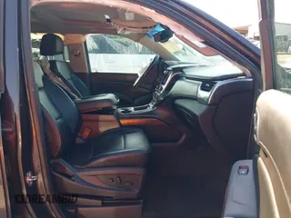 2015 Chevrolet Tahoe LT with VIN 1GNSCBKC5FR504459, listed as a IAAI auction lot 41689405 with 141,783 mi miles and . Bid and sale history available at DreamBid. Image 5.