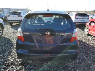 2009 Honda Fit Sport z VIN JHMGE88469S033171, wystawiony jako Copart lot #53021475 z przebiegiem 147 103 mil mil oraz Czysty tytuł • Clean title. Historia ofert i sprzedaży dostępna na DreamBid. Obrazek 6.