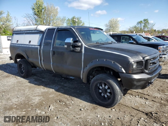 1999 Ford F-250 XL with VIN 1FTNX21L5XEA67499, listed as a Copart auction lot 50822095 with 480,067 mi miles and Salvage title. Bid and sale history available at DreamBid. Image 4.