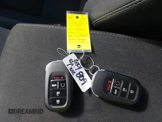 2025 Honda Civic Sport z VIN 2HGFE2F58SH556809, wystawiony jako IAAI lot #42081375 z przebiegiem 8 647 mil mil oraz . Historia ofert i sprzedaży dostępna na DreamBid. Obrazek 11.