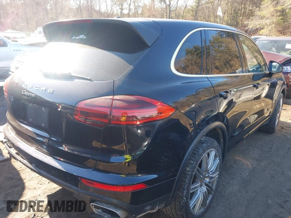 2016 Porsche Cayenne with VIN WP1AA2A28GKA37162, listed as a IAAI auction lot 41424921 with 95,717 mi miles. Bid and sale history available at carsss.com. Image 4.