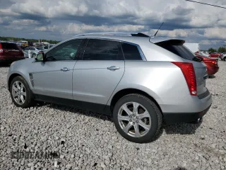 2011 Cadillac SRX Performance Collection z VIN 3GYFNBEY1BS527377, wystawiony jako Copart lot #57022915 z przebiegiem 193 905 mil mil oraz Tytuł czysty. Historia ofert i sprzedaży dostępna na DreamBid. Obrazek 2.