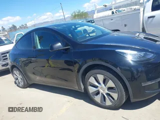 2020 Tesla Model Y Long Range with VIN 5YJYGDEE2LF059177, listed as a IAAI auction lot 41916260 with 66,190 mi miles and . Bid and sale history available at DreamBid. Image 13.