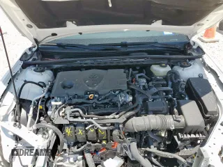 2025 Toyota Camry LE z VIN 4T1DAACK2SU556335, wystawiony jako Copart lot #57317485 z przebiegiem 3 410 mil mil oraz Szkoda całkowita • Salvage title. Historia ofert i sprzedaży dostępna na DreamBid. Obrazek 11.