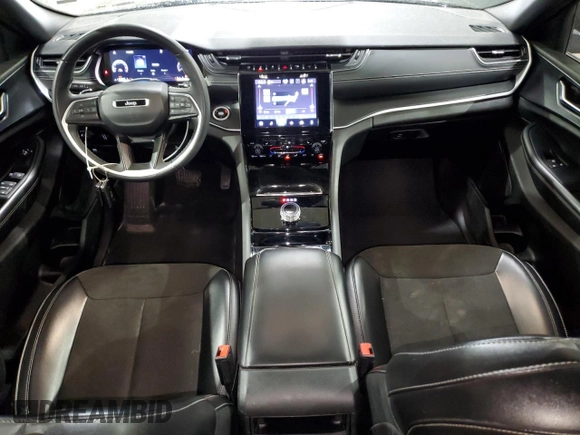 2023 Jeep Grand Cherokee Altitude with VIN 1C4RJHAG8PC580637, listed as a Copart auction lot 56832715 with 56,060 mi miles and Clean title. Bid and sale history available at DreamBid. Image 8.