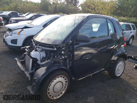 2013 Smart fortwo Passion z VIN WMEEJ9AA1DK717534, wystawiony jako Copart lot #73832094 z przebiegiem Nie podano mil oraz Tytuł czysty. Historia ofert i sprzedaży dostępna na DreamBid. Obrazek 1.