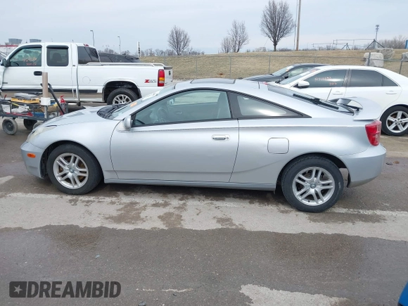 2005 Toyota Celica GT with VIN JTDDR32T950185575, listed as a IAAI auction lot 41710111 with 100,971 mi miles. Bid and sale history available at carsss.com. Image 14.