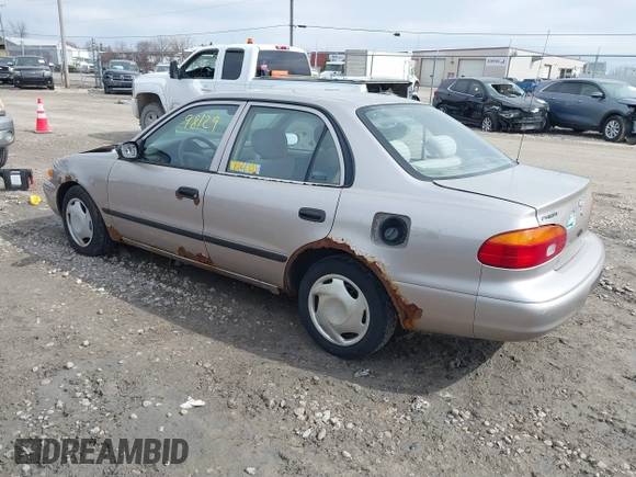 1999 Chevrolet Prizm z VIN 1Y1SK5488XZ446950, wystawiony jako IAAI lot #41798129 z przebiegiem 292 798 mil mil oraz . Historia ofert i sprzedaży dostępna na DreamBid. Obrazek 3.