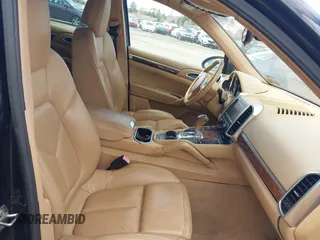 2011 Porsche Cayenne S Hybrid with VIN WP1AE2A27BLA91799, listed as a IAAI auction lot 42035613 with 131,480 mi miles. Bid and sale history available at carsss.com. Image 5.