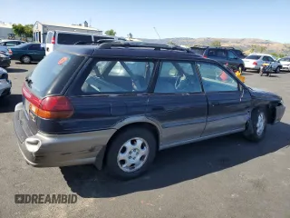 1996 Subaru Legacy with VIN 4S3BG4859T6986223, listed as a Copart auction lot 57683345 with 265,568 mi miles and Salvage title. Bid and sale history available at DreamBid. Image 3.