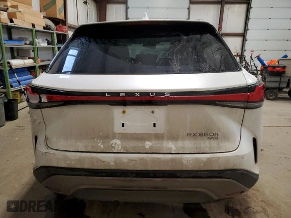 2023 Lexus RX with VIN 2T2BBMCA2PC014251, listed as a Copart auction lot 40668384 with 9,395 mi miles and Salvage Title. Bid and sale history available at carsss.com. Image 6.