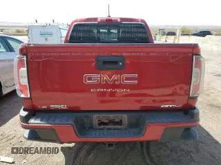 2021 GMC Canyon 4WD AT4 w/Cloth with VIN 1GTG6FEN4M1211349, listed as a Copart auction lot 52417985 with 63,744 mi miles and Salvage Title. Bid and sale history available at carsss.com. Image 6.