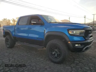 2021 Ram 1500 TRX with VIN 1C6SRFU98MN757772, listed as a Copart auction lot 49923465 with 27,250 mi miles and Salvage Title. Bid and sale history available at carsss.com. Image 4.