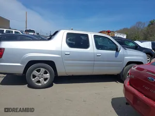 2009 Honda Ridgeline RTL with VIN 5FPYK16549B104258, listed as a IAAI auction lot 42073316 with 88,507 mi miles. Bid and sale history available at carsss.com. Image 13.