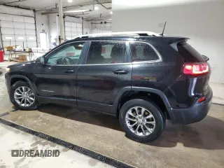 2019 Jeep Cherokee Altitude with VIN 1C4PJMLB1KD465818, listed as a Copart auction lot 57552705 with 191,300 mi miles and Salvage title. Bid and sale history available at DreamBid. Image 2.