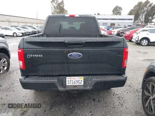 2015 Ford F-150 XL with VIN 1FTEW1CGXFKD98530, listed as a IAAI auction lot 41687753 with 104,281 mi miles. Bid and sale history available at carsss.com. Image 16.