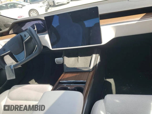 2023 Tesla Model S with VIN 5YJSA1E53PF525324, listed as a Copart auction lot 48079685 with Not provided miles and Salvage title. Bid and sale history available at DreamBid. Image 9.