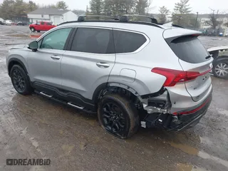 2023 Hyundai Santa Fe XRT with VIN 5NMS6DAJ8PH604900, listed as a IAAI auction lot 41526417 with 7,630 mi miles. Bid and sale history available at carsss.com. Image 3.