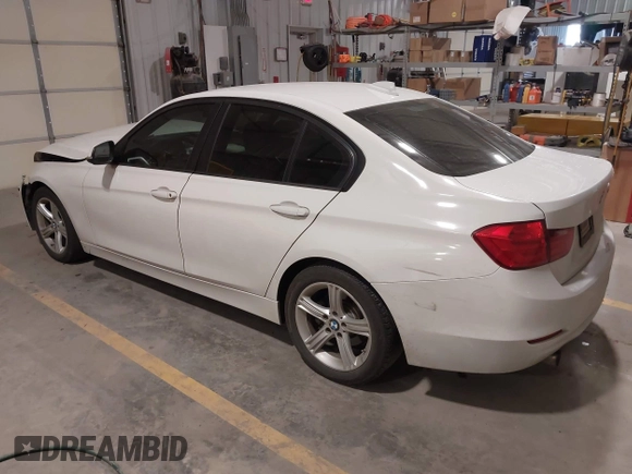 2014 BMW 3 Series 320i with VIN WBA3B1G57ENS79355, listed as a IAAI auction lot 41620998 with 97,362 mi miles. Bid and sale history available at carsss.com. Image 3.