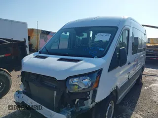 2024 Ford Transit Passenger XL with VIN 1FBAX2C89PKB52360, listed as a IAAI auction lot 41381594 with 43,067 mi miles and . Bid and sale history available at DreamBid. Image 2.