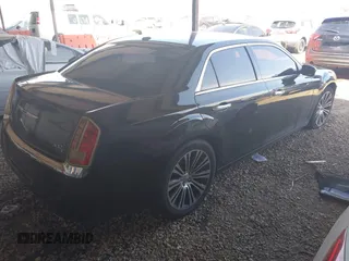 2013 Chrysler 300 with VIN 2C3CCAEG7DH630670, listed as a IAAI auction lot 41861420 with 240,128 mi miles. Bid and sale history available at carsss.com. Image 4.