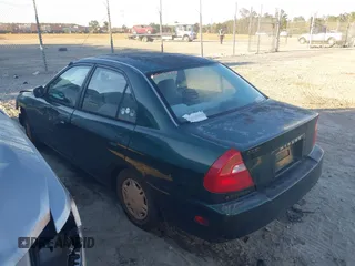1999 Mitsubishi Mirage DE z VIN JA3AY26A0XU017889, wystawiony jako IAAI lot #40457172 z przebiegiem Nie podano mil oraz . Historia ofert i sprzedaży dostępna na DreamBid. Obrazek 3.
