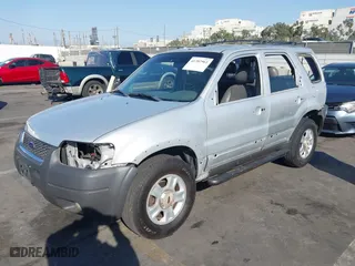 2002 Ford Escape XLT Choice with VIN 1FMYU03112KC92109, listed as a IAAI auction lot 41382961 with 105,145 mi miles. Bid and sale history available at carsss.com. Image 6.