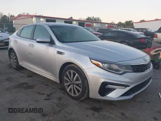 2019 Kia Optima LX with VIN 5XXGT4L39KG363028, listed as a IAAI auction lot 41469740 with 64,321 mi miles. Bid and sale history available at carsss.com. Image 1.