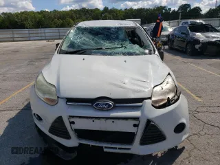 2013 Ford Focus S with VIN 1FADP3E2XDL326410, listed as a Copart auction lot 73015994 with 65,900 mi miles and Salvage Title. Bid and sale history available at carsss.com. Image 5.