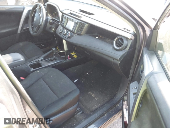2016 Toyota RAV4 LE with VIN JTMZFREV7GJ065267, listed as a IAAI auction lot 42011267 with 180,127 mi miles. Bid and sale history available at carsss.com. Image 5.