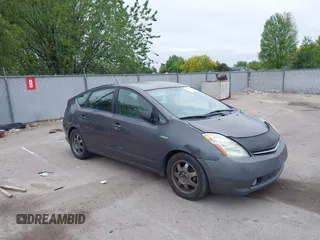 2007 Toyota Prius z VIN JTDKB20U473205296, wystawiony jako IAAI lot #42238002 z przebiegiem Nie podano mil oraz . Historia ofert i sprzedaży dostępna na DreamBid. Obrazek 1.