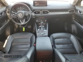 2021 Mazda CX-5 Grand Touring with VIN JM3KFBDM4M1462570, listed as a Copart auction lot 54827675 with 45,389 mi miles and Salvage Title. Bid and sale history available at DreamBid. Image 8.