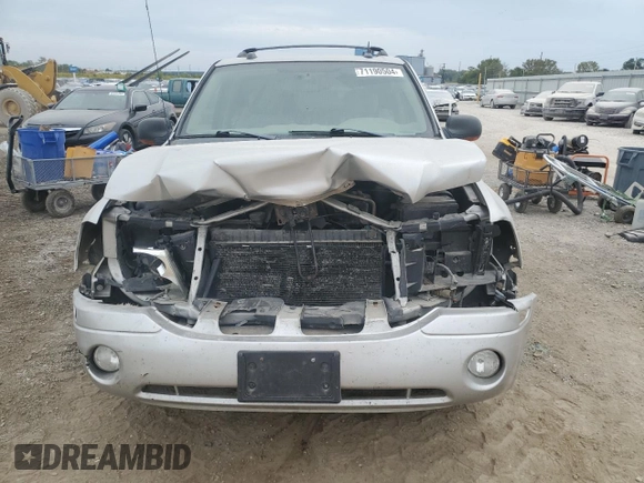 2005 GMC Envoy SLT with VIN 1GKDT13S852330514, listed as a Copart auction lot 71190504 with 203,616 mi miles and Salvage Title. Bid and sale history available at carsss.com. Image 5.