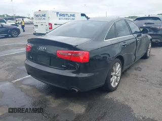 2015 Audi A6 Premium Plus z VIN WAUGFAFC6FN028169, wystawiony jako IAAI lot #42273931 z przebiegiem 100 056 mil mil oraz . Historia ofert i sprzedaży dostępna na DreamBid. Obrazek 4.