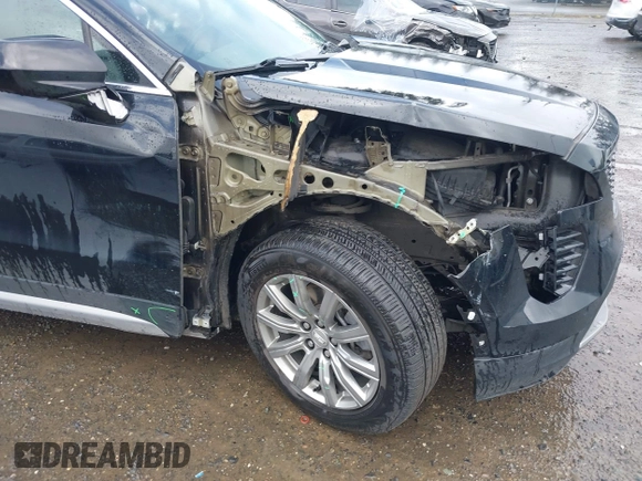 2020 Cadillac XT4 AWD Premium Luxury z VIN 1GYFZDR45LF049638, wystawiony jako IAAI lot #42216996 z przebiegiem 82 760 mil mil oraz . Historia ofert i sprzedaży dostępna na DreamBid. Obrazek 6.