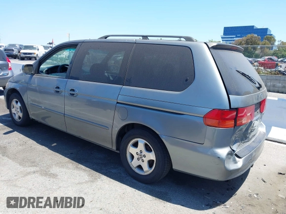 1999 Honda Odyssey EX z VIN 2HKRL1861XH549362, wystawiony jako IAAI lot #42400965 z przebiegiem 193 403 mil mil oraz . Historia ofert i sprzedaży dostępna na DreamBid. Obrazek 3.