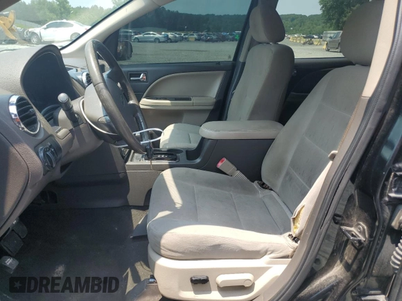 2008 Ford Taurus X SEL with VIN 1FMDK02W08GA29428, listed as a Copart auction lot 58902675 with 256,008 mi miles and Salvage title. Bid and sale history available at DreamBid. Image 7.