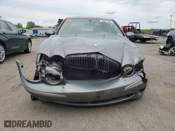 2003 Jaguar X-Type z VIN SAJEB52D33XD54978, wystawiony jako Copart lot #58027805 z przebiegiem Nie podano mil oraz Szkoda całkowita • Salvage title. Historia ofert i sprzedaży dostępna na DreamBid. Obrazek 5.