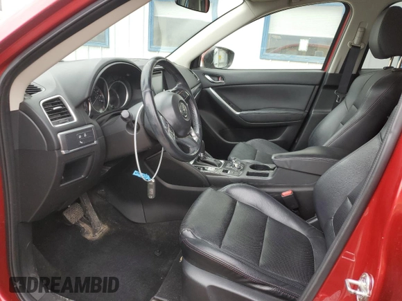 2016 Mazda CX-5 Grand Touring with VIN JM3KE4DY9G0771088, listed as a Copart auction lot 50615495 with 93,221 mi miles and Salvage Title. Bid and sale history available at DreamBid. Image 7.
