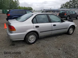 1996 Honda Civic DX z VIN 2HGEJ6521TH548106, wystawiony jako Copart lot #62088455 z przebiegiem 195 790 mil mil oraz Czysty tytuł • Clean title. Historia ofert i sprzedaży dostępna na DreamBid. Obrazek 3.