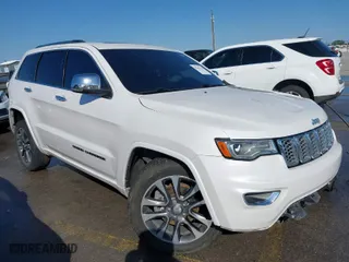 2017 Jeep Grand Cherokee Overland with VIN 1C4RJECGXHC636297, listed as a IAAI auction lot 41661922 with 111,477 mi miles. Bid and sale history available at carsss.com. Image 1.
