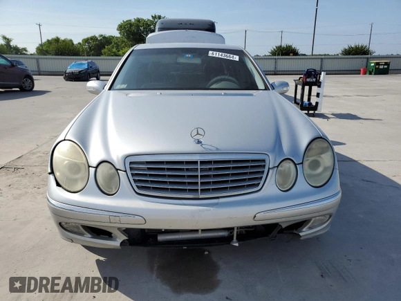 2004 Mercedes-Benz E-Class 5.0L with VIN WDBUF70J84A492244, listed as a Copart auction lot 61143664 with 165,750 mi miles and Salvage Title. Bid and sale history available at carsss.com. Image 5.
